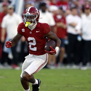 Oct 26, 2024; Tuscaloosa, Alabama, USA;  Alabama Crimson Tide wide receiver Ryan Williams (2) carries the ball after a reception against the Missouri Tigers during the second half at Bryant-Denny Stadium. Mandatory Credit: Butch Dill-Imagn Images