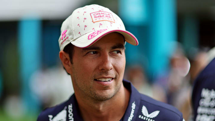 May 5, 2024; Miami Gardens, Florida, USA; Red Bull Racing driver Sergio Perez (11) walks in the paddock before the F1 Miami Grand Prix at Miami International Autodrome. Mandatory Credit: Peter Casey-USA TODAY Sports