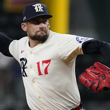 Jul 19, 2024; Arlington, Texas, USA; Texas Rangers pitcher Nathan Eovaldi (17) throws to the plate during the first inning against the Baltimore Orioles at Globe Life Field