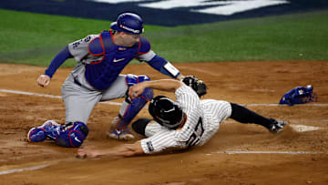 Oct 28, 2024; New York, New York, USA; Los Angeles Dodgers catcher Will Smith (16) tags out New York Yankees designated hitter Giancarlo Stanton (27) during the fourth inning in game three of the 2024 MLB World Series at Yankee Stadium. 