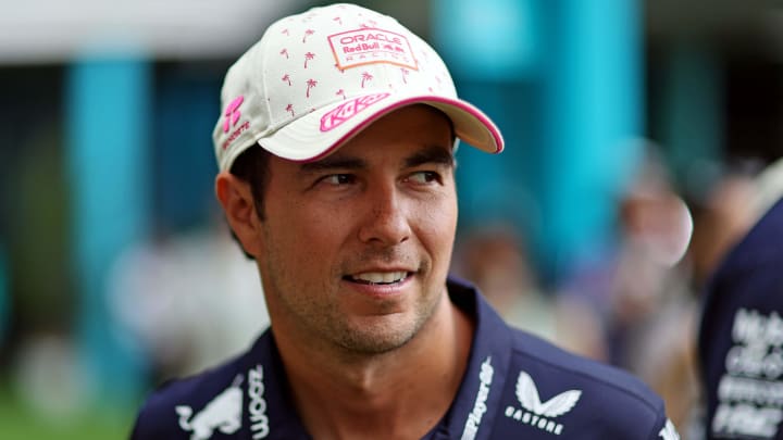 May 5, 2024; Miami Gardens, Florida, USA; Red Bull Racing driver Sergio Perez (11) walks in the paddock before the F1 Miami Grand Prix at Miami International Autodrome. Mandatory Credit: Peter Casey-USA TODAY Sports