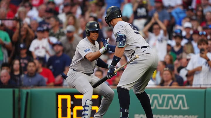 Jul 27, 2024; Boston, Massachusetts, USA; New York Yankees designated hitter Aaron Judge (99) congratulates New York Yankees left fielder Juan Soto (22) for hitting a two-run home run against the Boston Red Sox during the first inning at Fenway Park. Mandatory Credit: Gregory Fisher-USA TODAY Sports