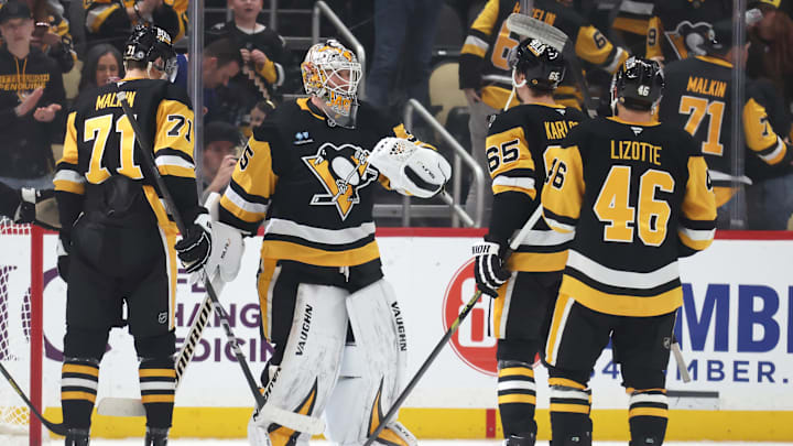 Mar 13, 2025; Pittsburgh, Pennsylvania, USA; Pittsburgh Penguins center Evgeni Malkin (71) and goaltender Tristan Jarry (35) and defenseman Erik Karlsson (65) and center Blake Lizotte (46) celebrate after defeating the St. Louis Blues at PPG Paints Arena. Mandatory Credit: Charles LeClaire-Imagn Images Mar 13, 2025; Pittsburgh, Pennsylvania, USA; Pittsburgh Penguins center Evgeni Malkin (71) and goaltender Tristan Jarry (35) and defenseman Erik Karlsson (65) and center Blake Lizotte (46) celebrate after defeating the St. Louis Blues at PPG Paints Arena. Mandatory Credit: Charles LeClaire-Imagn Images