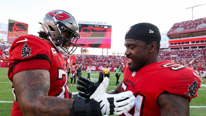 Tampa Bay Buccaneers offensive tackle Tristan Wirfs and linebacker Lavonte David. Tampa Bay Buccaneers offensive tackle Tristan Wirfs and linebacker Lavonte David.
