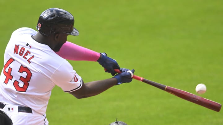 Jul 6, 2024; Cleveland, Ohio, USA; Cleveland Guardians right fielder Jhonkensy Noel (43) hits an RBI sacrifice fly ball in the first inning against the San Francisco Giants at Progressive Field. Mandatory Credit: David Richard-USA TODAY Sports