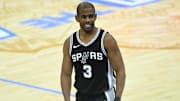 Mar 27, 2025; Cleveland, Ohio, USA; San Antonio Spurs guard Chris Paul (3) reacts after a play in the fourth quarter against the Cleveland Cavaliers at Rocket Arena. Mandatory Credit: David Richard-Imagn Images