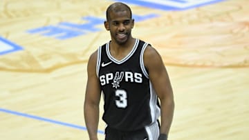 Mar 27, 2025; Cleveland, Ohio, USA; San Antonio Spurs guard Chris Paul (3) reacts after a play in the fourth quarter against the Cleveland Cavaliers at Rocket Arena. Mandatory Credit: David Richard-Imagn Images
