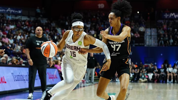 Sep 1, 2025; Uncasville, Connecticut, USA; Atlanta Dream guard Allisha Gray (15) drives the ball against Connecticut Sun guard Leila Lacan (47) in the first half at Mohegan Sun Arena. Mandatory Credit: David Butler II-Imagn Images
