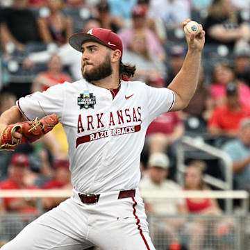 Arkansas Razorbacks starting pitcher Zach Root (33) throws against the UCLA Bruins during the first inning at Charles Schwab Field on June 17.