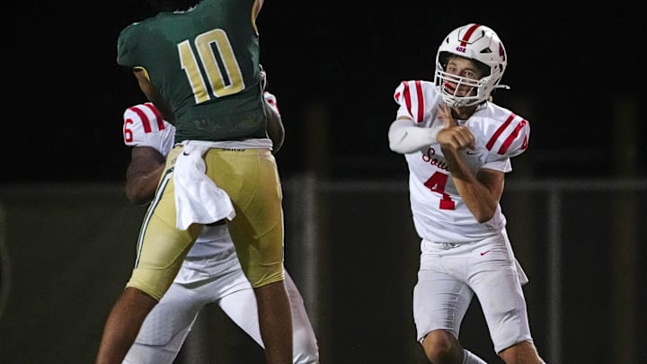 Millard South Jett Thomalla (4) passes against pressure from Basha defensive end Darian (Bleu) Dantzler (10) during a game at Basha High School in Chandler on Aug. 30, 2024.