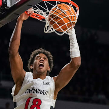 Cincinnati Bearcats forward Baba Miller (18) dunks in the first half of the NCAA men’s basketball game between the Cincinnati Bearcats and the Western Carolina Catamounts at Fifth Third Arena in Cincinnati on Monday, Nov. 3, 2025.