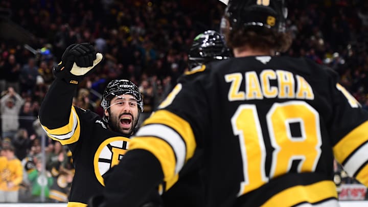 Jan 29, 2026; Boston, Massachusetts, USA; Boston Bruins defenseman Jonathan Aspirot (45) reacts after a goal by center Pavel Zacha (18) during the first period against the Philadelphia Flyers at TD Garden. Mandatory Credit: Bob DeChiara-Imagn Images