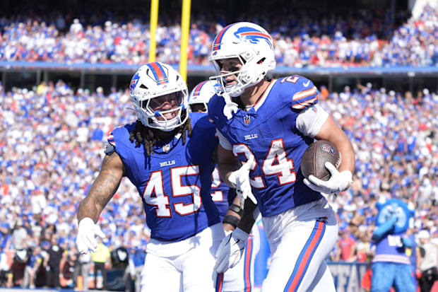 Buffalo Bills S Cole Bishop and LB Shaq Thompson celebrate after an interception against New Orleans.