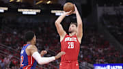 Oct 24, 2025; Houston, Texas, USA; Houston Rockets center Alperen Sengun (28) shoots the ball as Detroit Pistons forward Tobias Harris (12) defends during the first quarter at Toyota Center. Mandatory Credit: Troy Taormina-Imagn Images