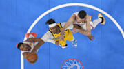 Myles Turner shoots against Aaron Wiggins (left) and Chet Holmgren (right) during the 2025 NBA Finals.