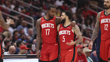Apr 23, 2025; Houston, Texas, USA; Houston Rockets forward Tari Eason (17) talks with guard Fred VanVleet (5) during the third quarter during game two of the first round for the 2024 NBA Playoffs against the Golden State Warriors at Toyota Center. Mandatory Credit: Troy Taormina-Imagn Images