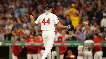 Boston Red Sox relief pitcher Rich Hill (44) reacts after striking out the last batter to end the seventh inning against the Toronto Blue Jays at Fenway Park in 2024.