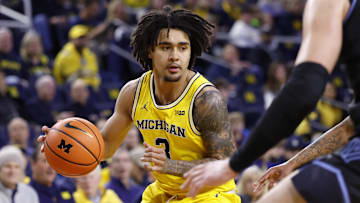 Dec 9, 2025; Ann Arbor, Michigan, USA;  Michigan Wolverines guard Elliot Cadeau (3) dribbles in the first half against the Villanova Wildcats at Crisler Center. Mandatory Credit: Rick Osentoski-Imagn Images