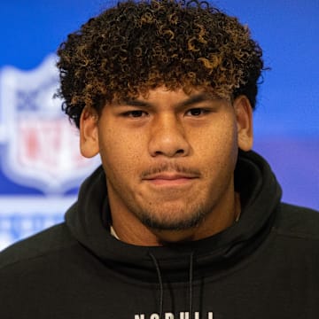 Mar 2, 2024; Indianapolis, IN, USA; Brigham Young offensive lineman Kingsley Suamataia (OL65) talks to the media during the 2024 NFL Combine at Lucas Oil Stadium. Mandatory Credit: Trevor Ruszkowski-Imagn Images