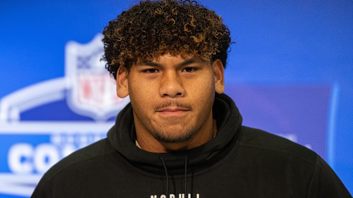 Mar 2, 2024; Indianapolis, IN, USA; Brigham Young offensive lineman Kingsley Suamataia (OL65) talks to the media during the 2024 NFL Combine at Lucas Oil Stadium. Mandatory Credit: Trevor Ruszkowski-Imagn Images