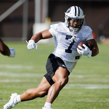 BYU RB Hinckley Ropati runs the ball during day one of Fall camp