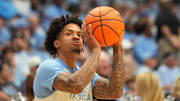 Oct 4, 2025; Charlotte, NC, USA; North Carolina Tar Heels guard Jonathan Powell (11) warms up before the game at Dean E. Smith Center. Mandatory Credit: Bob Donnan-Imagn Images