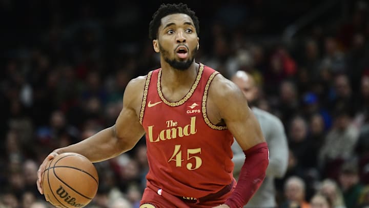 Feb 12, 2024; Cleveland, Ohio, USA; Cleveland Cavaliers guard Donovan Mitchell (45) brings the ball up court during the second half against the Philadelphia 76ers at Rocket Mortgage FieldHouse. Mandatory Credit: Ken Blaze-Imagn Images