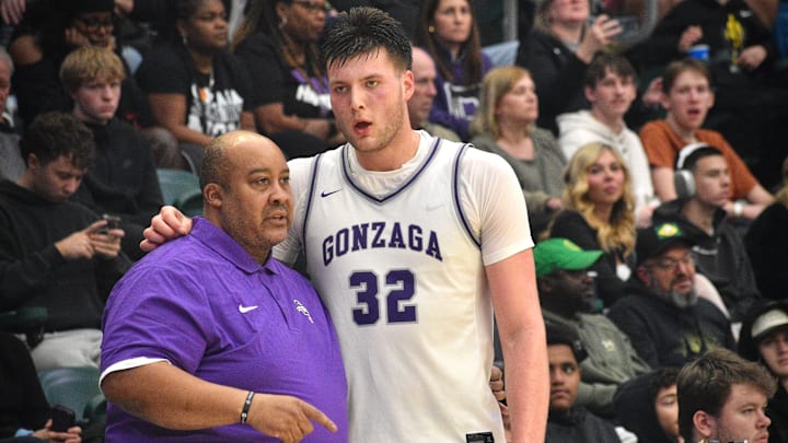 Gonzaga College center Christian Gurdak and head coach Steve Turner talk during a Les Schwab Invitational title win over La Lumiere in Portland.