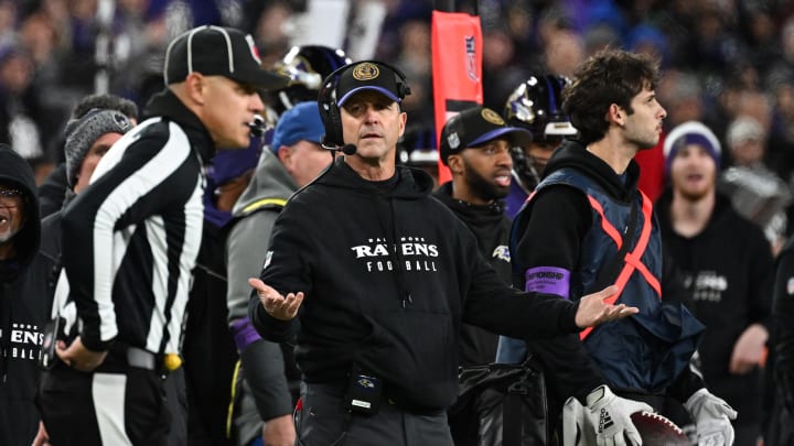 Jan 28, 2024; Baltimore, Maryland, USA; Baltimore Ravens head coach John Harbaugh (center) questions a call against the Kansas City Chiefs during the second half in the AFC Championship football game at M&T Bank Stadium. Mandatory Credit: Tommy Gilligan-USA TODAY Sports