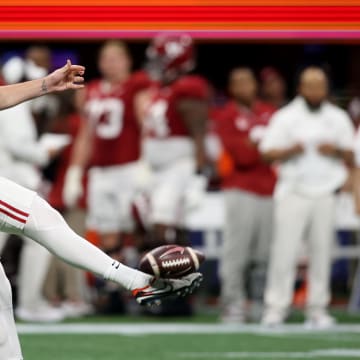 Dec 2, 2023; Atlanta, GA, USA; Alabama Crimson Tide punter James Burnip (86) punts against the Georgia Bulldogs in the first quarter  at Mercedes-Benz Stadium. Mandatory Credit: Brett Davis-USA TODAY Sports