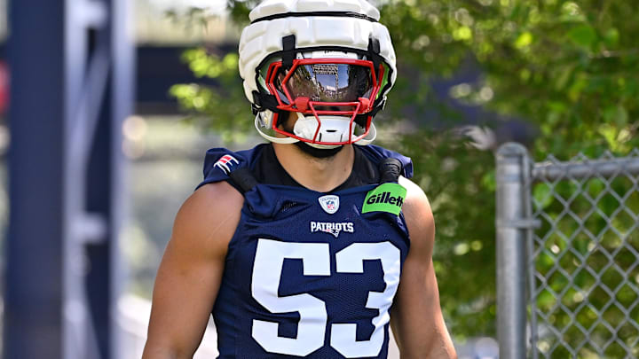 New England Patriots linebacker Christian Elliss (53) walks to the practice field for training camp at Gillette Stadium. Mandatory Credit: Eric Canha-Imagn Images