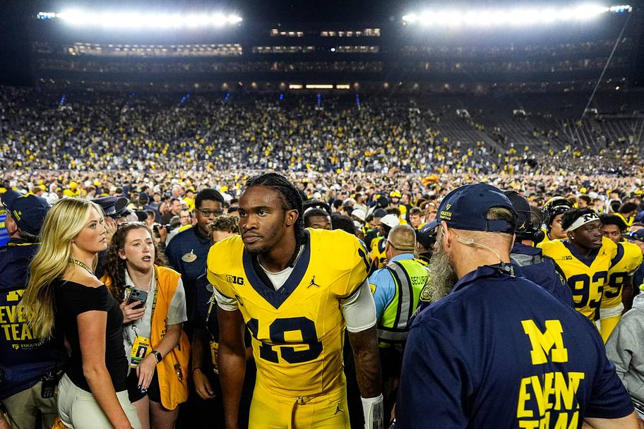 Michigan quarterback Bryce Underwood exits the field after a 13–12 win over Western Michigan.