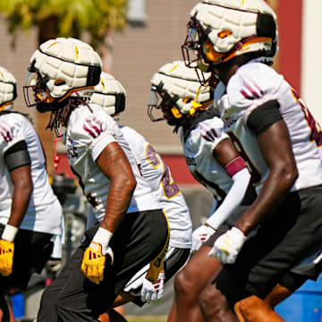 Arizona State defensive backs back peddle during the first day of fall practice in Tempe, Ariz. on July 30, 2025.