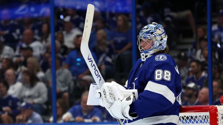 Apr 27, 2024; Tampa, Florida, USA; Tampa Bay Lightning goaltender Andrei Vasilevskiy (88) looks down after he gave up a goal against the Florida Panthers during the second period in game four of the first round of the 2024 Stanley Cup Playoffs at Amalie Arena. Mandatory Credit: Kim Klement Neitzel-USA TODAY Sports