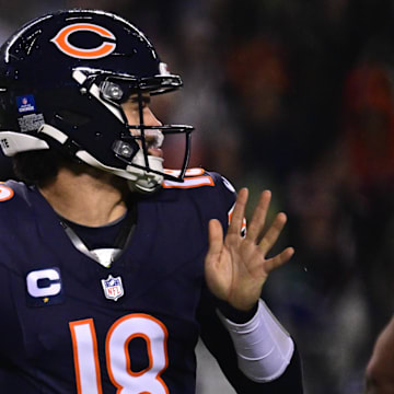 Chicago Bears quarterback Caleb Williams (18) passes the ball against the Seattle Seahawks during the first quarter at Soldier Field.