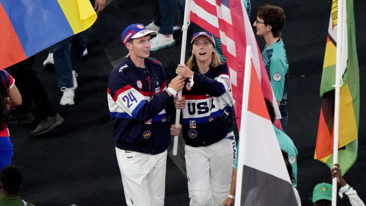 Aug 11, 2024; Saint-Denis, France; United States flag bearers Katie Ledecky and Nick Mead during the closing ceremony for the Paris 2024 Olympic Summer Games at Stade de France. Mandatory Credit: Kyle Terada-USA TODAY Sports