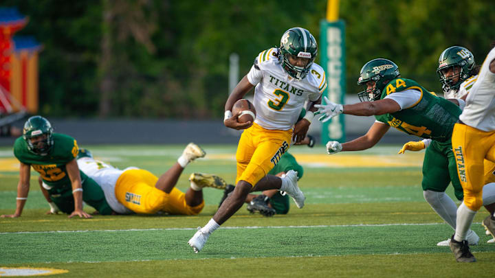 Reynold  reaches for West Forsyth’s quarterback, August 23, 2024.