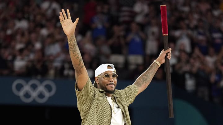 Aug 6, 2024; Paris, France; Carmelo Anthony performs before a men’s basketball quarterfinal game between the United States and Brazil during the Paris 2024 Olympic Summer Games at Accor Arena. Mandatory Credit: Kyle Terada-USA TODAY Sports