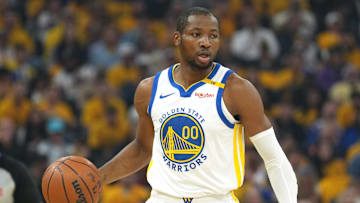 Apr 26, 2025; San Francisco, California, USA; Golden State Warriors forward Jonathan Kuminga (00) handles the ball against the Houston Rockets during the first quarter of game three of first round for the 2024 NBA Playoffs at Chase Center. Mandatory Credit: Darren Yamashita-Imagn Images