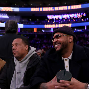 Jan 17, 2024; New York, New York, USA; New York Knicks former player Carmelo Anthony sits court side during the second quarter between the New York Knicks and the Houston Rockets at Madison Square Garden. Mandatory Credit: Brad Penner-Imagn Images
