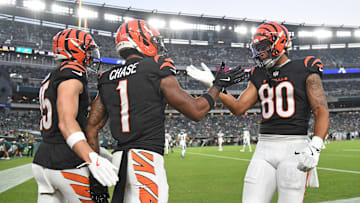 Cincinnati Bengals wide receiver Ja'Marr Chase celebrates his touchdown with Charlie Jones and wide receiver Andrei Iosivas