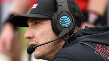 Texas Tech's offensive coordinator and quarterbacks coach Zach Kittley stands on the sidelines during the Big 12 football game against Texas Tech, Saturday, Nov. 18, 2023, at Jones AT&T Stadium.