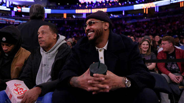 Jan 17, 2024; New York, New York, USA; New York Knicks former player Carmelo Anthony sits court side during the second quarter between the New York Knicks and the Houston Rockets at Madison Square Garden. Mandatory Credit: Brad Penner-Imagn Images