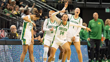 Oregon’s bench celebrates a foul as the Oregon Ducks host the Western Oregon Wolves in an exhibition game at Matthew Knight Arena in Eugene on Oct. 30, 2025.