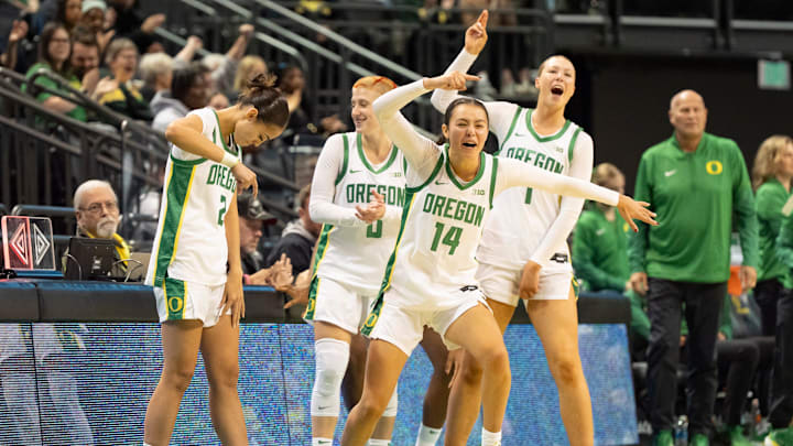 Oregon’s bench celebrates a foul as the Oregon Ducks host the Western Oregon Wolves in an exhibition game at Matthew Knight Arena in Eugene on Oct. 30, 2025.