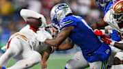 Oct 10, 2024; Seattle, Washington, USA; Seattle Seahawks linebacker Tyrel Dodson (0) tackles San Francisco 49ers fullback Kyle Juszczyk (44) during the second half at Lumen Field. Mandatory Credit: Steven Bisig-Imagn Images