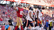 Dec 8, 2024; Santa Clara, California, USA; San Francisco 49ers tight end George Kittle (85) reacts after catching a pass for a first down against the Chicago Bears in the third quarter at Levi's Stadium. Mandatory Credit: Cary Edmondson-Imagn Images