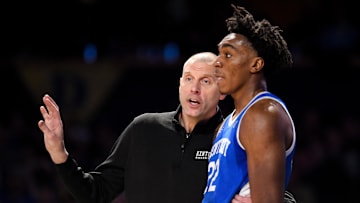 Jan 25, 2025; Nashville, Tennessee, USA;  Kentucky Wildcats head coach Mark Pope talks with center Amari Williams (22) against the Vanderbilt Commodores during the first half at Memorial Gymnasium. Mandatory Credit: Steve Roberts-Imagn Images
