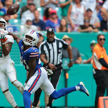 Nov 9, 2025; Miami Gardens, Florida, USA; Miami Dolphins wide receiver Jaylen Waddle (17) makes a touchdown catch against Buffalo Bills cornerback Maxwell Hairston (31) during the first half at Hard Rock Stadium