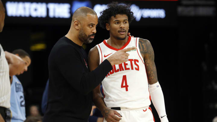 Dec 15, 2023; Memphis, Tennessee, USA; Houston Rockets head coach Ime Udoka (left) talks with guard Jalen Green (4) during the second half against the Memphis Grizzlies  at FedExForum. Mandatory Credit: Petre Thomas-USA TODAY Sports